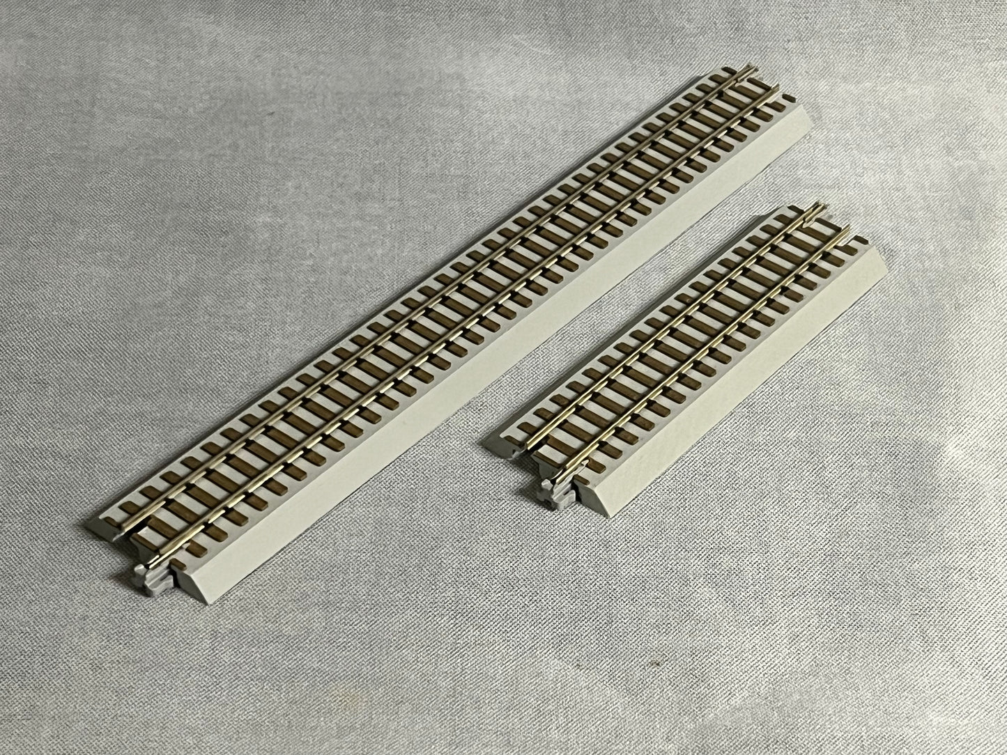 Mainline Railworks HOn3 Sectional Straight Track 12-Pack (Buy 10, Get 2 Free)